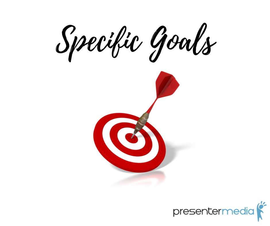 Specific goals with red and white target with dart centered on the bullseye