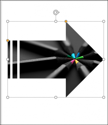 An picture of many colored pencils in a circle cropped into an arrow shape.